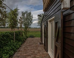 Prachtige buitenruimte van vakantiewoning in Beusichem, omgeven door natuur in Rivierengebied.