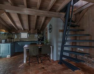 Open keuken en eetruimte in vakantiehuisje Beusichem, ideaal voor gezellig samenzijn in Gelderland.