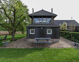 Vakantiehuisje in Beusichem met ruime tuin en zitgelegenheid in Gelderland.