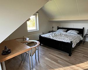Ruime slaapkamer in Vakantiehuisje in Driel, Rivierengebied.