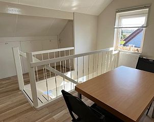 Bovenverdieping met werkruimte in Vakantiehuisje in Driel.