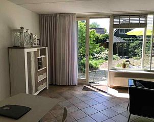 Authentieke bar bij vakantiehuis DG312 in Winterswijk met gezellige sfeer.