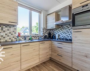 Grote tuin met trampoline bij DG238 vakantiehuis Winterswijk Achterhoek.