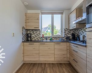 Sfeervolle slaapkamer in DG238 vakantiehuis Winterswijk Achterhoek met bosuitzicht.