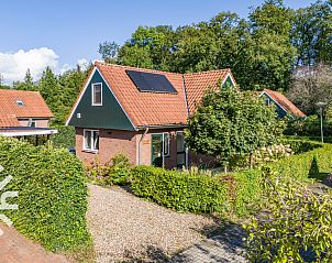 Vakantiehuis DG993 in Winterswijk, Achterhoek omgeven door groen en rust.