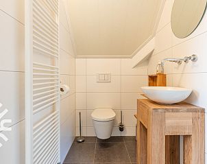 Eet- en zithoek in vakantiehuis DG993, Winterswijk, Achterhoek.