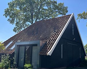 Vacation cottage in Winterswijk, Achterhoek, Gelderland with traditional architecture and rural charm.