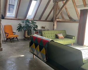 Stylish living room in Holiday Home in Winterswijk, ideal for relaxation in the Achterhoek.