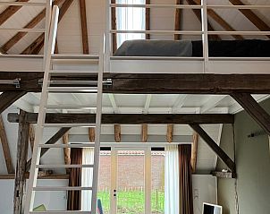 Open loft with sleeping space in Holiday Home in Winterswijk, ideal for a unique experience.