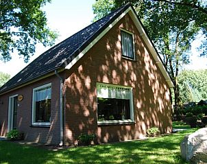 Vakantiehuisje in Winterswijk, gelegen in de groene Achterhoek, Gelderland, met een charmante bakstenen buitenkant en omgeven door natuur.