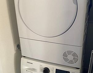 Modern laundry room in Holiday home in Winterswijk, located in the green Achterhoek region of Gelderland, offers comfort during your stay.