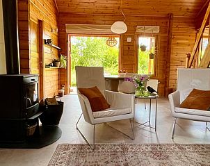 Cozy living room with wood stove in Holiday home in Winterswijk, Achterhoek, Gelderland.