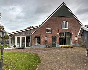Charming Holiday Home in Winterswijk, Achterhoek with historic facade and rural setting.