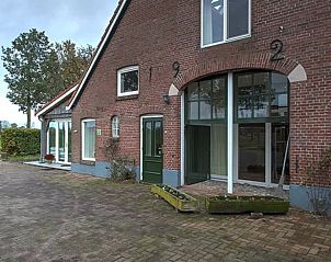 Authentic Holiday Home in Winterswijk, Gelderland with spacious entrance and green surroundings.