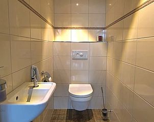 Stylish toilet room in Holiday Home in Winterswijk, ideal for a comfortable stay.