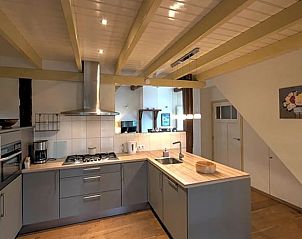 Fully equipped kitchen in Holiday Home in Winterswijk, perfect for culinary adventures.