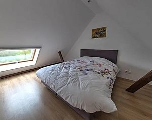 Bedroom with skylight in Holiday Home in Winterswijk, Achterhoek with comfortable double bed.