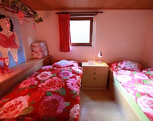 Second bedroom in Holiday Home, Winterswijk, Achterhoek, with cheerful decorations and warm atmosphere.