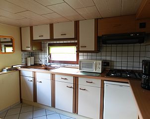 Functional kitchen in Holiday Home, Winterswijk, Achterhoek, with modern appliances and lots of light.