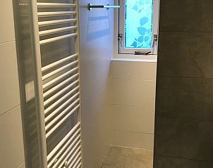 Luxury shower with heated towel radiator in Holiday home in Winterswijk, Achterhoek, for ultimate comfort.