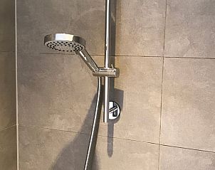Modern shower head in Holiday Home in Winterswijk, Achterhoek, for a refreshing shower experience.