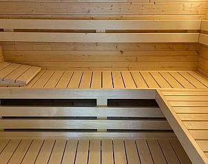 Wooden sauna in Holiday Home in Winterswijk, Achterhoek, offers a relaxing wellness experience.