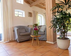 Comfortabele zithoek in Vakantiehuisje in Barchem, Achterhoek, Gelderland, met moderne inrichting.