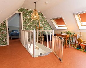 Speelse zolderruimte in Vakantiehuisje in Barchem, Achterhoek, Gelderland, ideaal voor gezinnen.