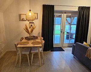 Binnenruimte van Huisje in Barchem, vakantiehuis in Gelderland met gezellige eetkamer.