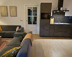 Moderne woonkamer van Huisje in Barchem, vakantieverblijf in Achterhoek met stijlvolle inrichting.