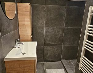 Slaapkamer in Huisje in Barchem, vakantieaccommodatie in Achterhoek met comfortabele bedden.