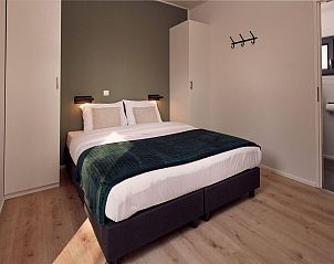 Slaapkamer met tweepersoonsbed in Vakantievilla Amalia 2, Kotten, Achterhoek.