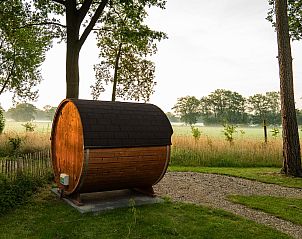 Enjoy the sauna at Holiday Villa Boslodge 2 in Kotten, Achterhoek, surrounded by serene nature and wide views in Gelderland.