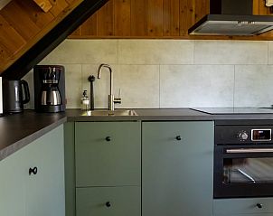 Stijlvolle keuken van Vakantiehuisje in Rekken met moderne voorzieningen in Achterhoek, Gelderland.