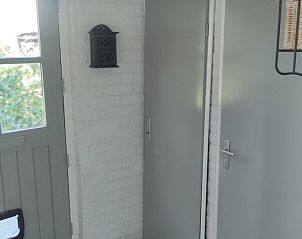 Gezellige hal van Vakantiehuis in Varsseveld, Achterhoek, met landelijke elementen in Heelweg, Gelderland.