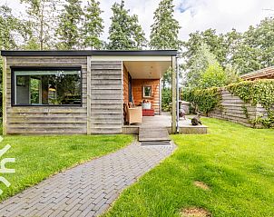 Gezellige woonkamer met uitzicht in vakantiehuis DG411 in Heelweg, Achterhoek.