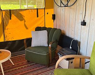 Knusse zithoek in Vakantiehuis in Heelweg, Achterhoek, Gelderland, met comfortabele stoelen en een rustieke inrichting.