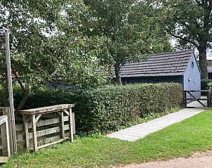 Ingang van Vakantiehuis in Zelhem, Achterhoek, Gelderland omgeven door groen en rustgevende natuur.