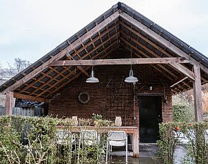 Overdekt terras bij Huisje in Zelhem, vakantieverblijf in de Achterhoek, Gelderland.