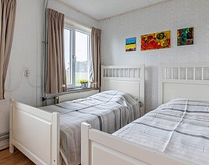 Tweede slaapkamer in Vakantiehuis in Aalten, biedt een lichte en luchtige sfeer in Gelderland.