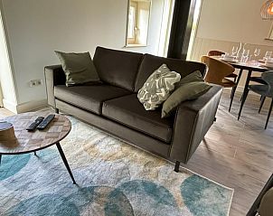 Stijlvolle zithoek in Huisje in Aalten, vakantiehuis in Aalten, Achterhoek, perfect voor ontspanning.