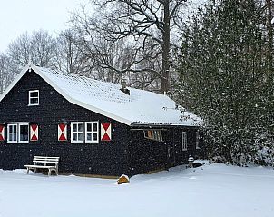 Vacation cottage in Aalten, a cozy vacation home in the snowy nature of the Achterhoek, Gelderland.
