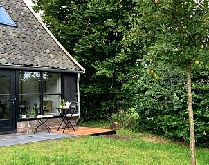 Gezellig vakantiehuisje in Aalten met terras, omringd door groene natuur in de Achterhoek, Gelderland. Perfect voor een ontspannen verblijf.