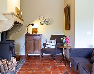 Knusse zithoek met open haard in Huisje in Laren (GLD), vakantiehuis in de Achterhoek, Gelderland.