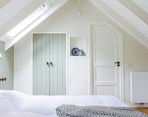Lichte slaapkamer op zolder van Huisje in Laren (GLD), vakantiehuis in de Achterhoek, Gelderland.