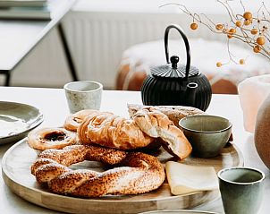 Heerlijke ontbijtopties in vakantiehuis in Lochem, perfect voor een ontspannen ochtend.