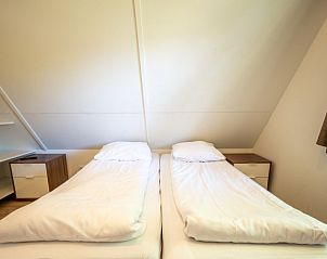 Tweede slaapkamer in Vakantiehuis Bronckhorst 6, Lochem, Achterhoek, Gelderland, met aangename sfeer.