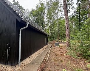 Exterior of Holiday Home in Lochem, Achterhoek, Gelderland, surrounded by beautiful forests.