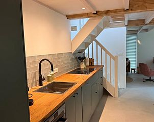 Open kitchen and living room in Holiday home in Lochem, Achterhoek, Gelderland, with lots of light.