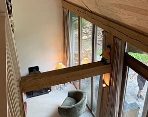 View from the top floor of Holiday Home in Lochem, Achterhoek, Gelderland, with tall windows.